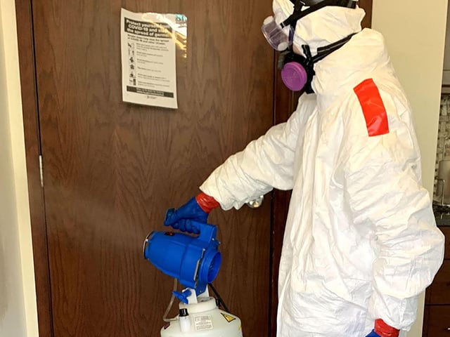 Close spraying of disinfectant